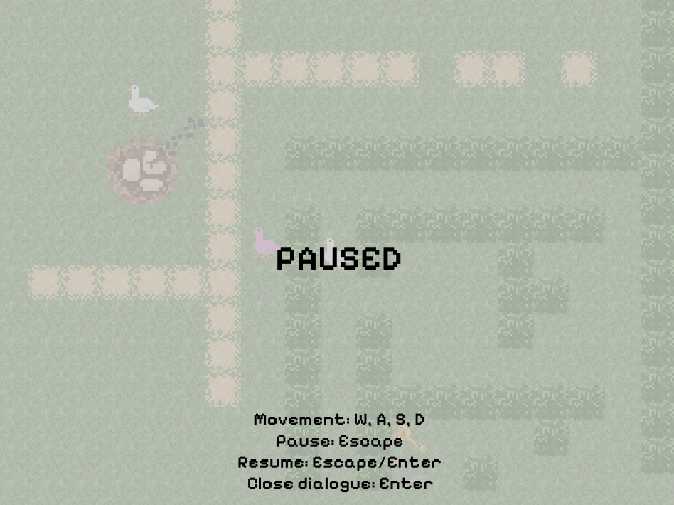 The Goose pause screen: The word 'paused' and instructions on a faded grass background